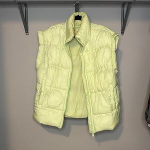 In a Bubble Puffer Vest from Free People Movement